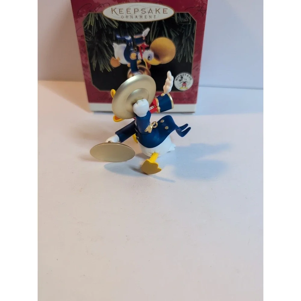 Disney Hallmark Donald Plays the Symbols 1999 Vintage Ornament